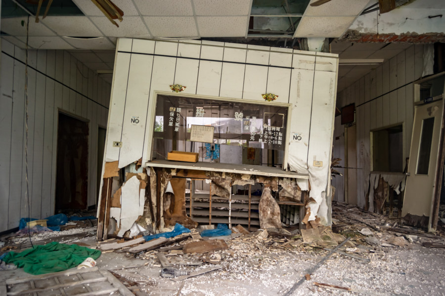 Decaying Front Counter at an Old Hospital