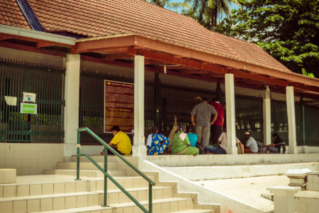 Pilgrims at the most famous tomb on Pulau Besar