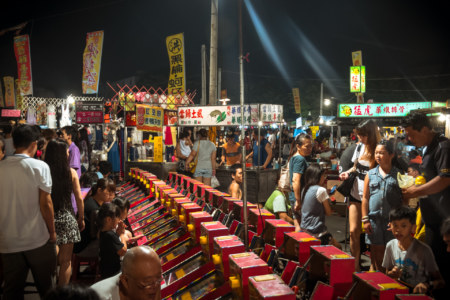 Playing games at Jingcheng Night Market