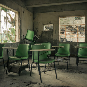 Green chairs at the abandoned clinic