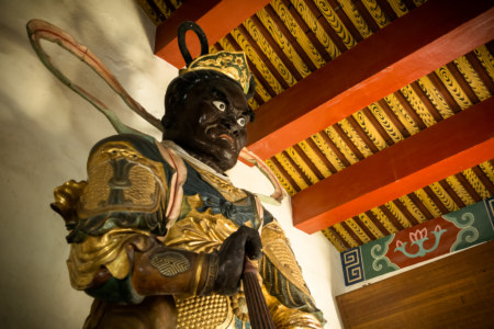 Guarding the entrance at Fahua Temple