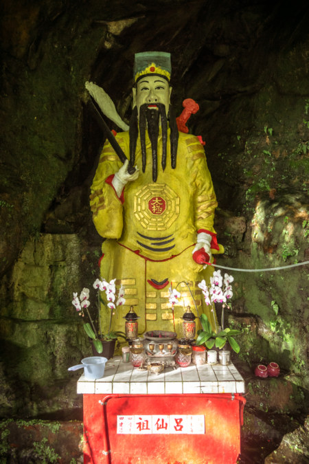 The shrine behind the waterfall at Yinhe Cave