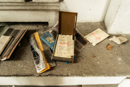 An old phone book and photos at the White Lion House