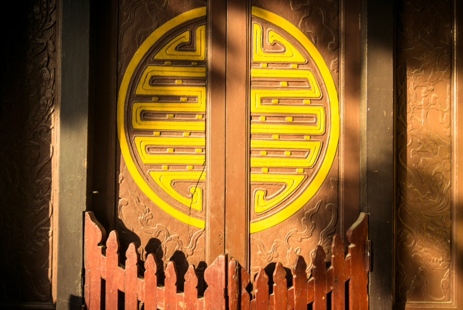Doorway to a Hanoi shrine at sundown