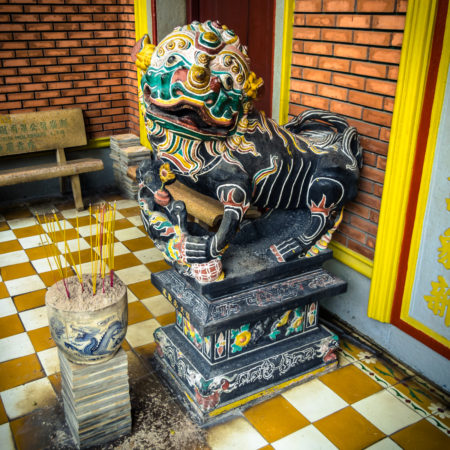 Vibrant Stone Lion at Phuoc An Hoi Quan Pagoda